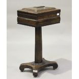 An early Victorian rosewood teapoy, converted to a work table, the oval section column with a beaded