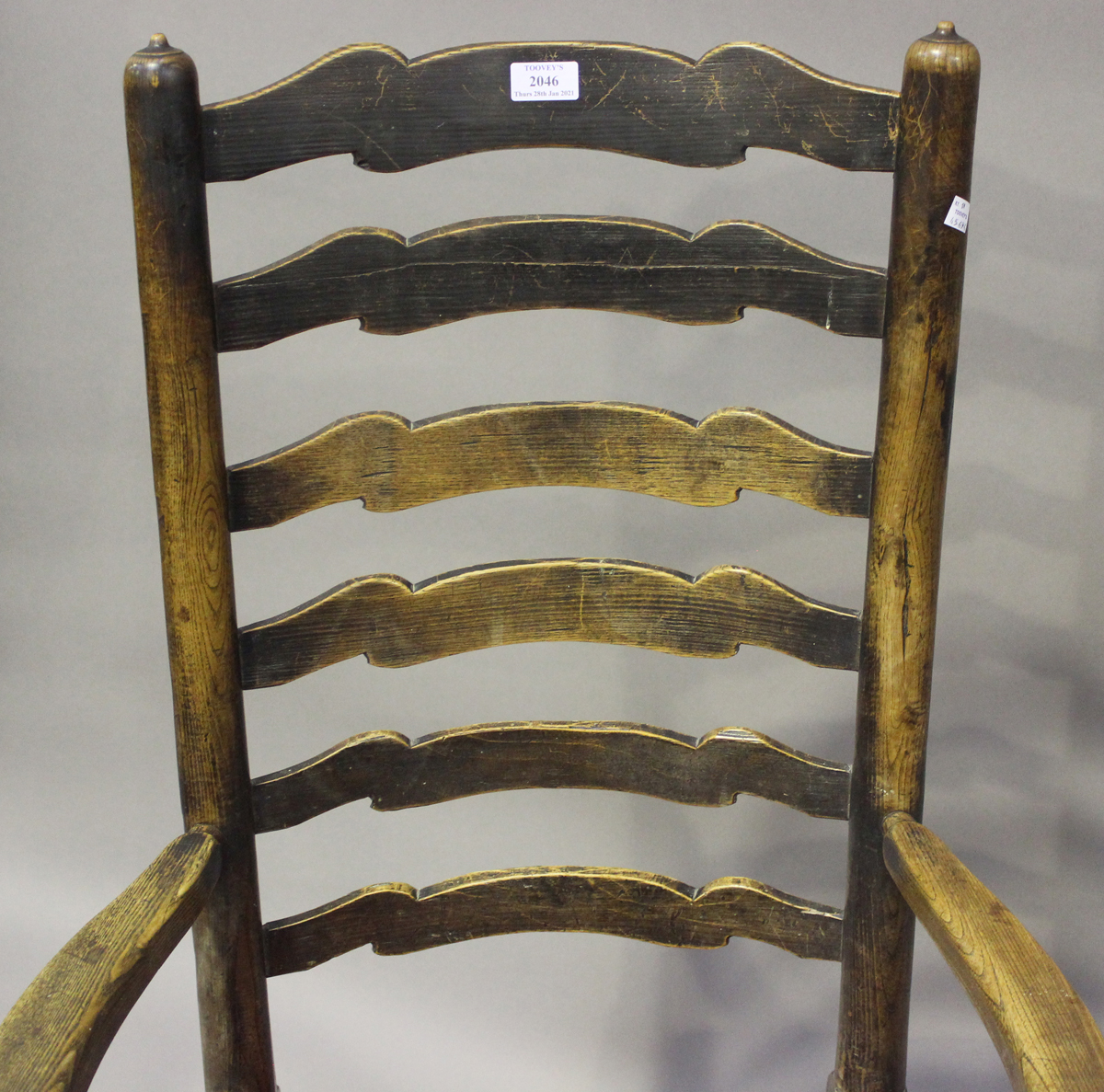 A 19th century ash ladder back carver chair, on turned legs united by stretchers, height 110cm, - Image 3 of 4