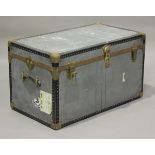 An early 20th century zinc and metal bound travelling trunk, height 52cm, width 91cm.Buyer’s Premium