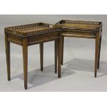 A pair of late 20th century reproduction mahogany occasional tables with pierced galleries, height