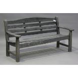 A late 20th century wooden slatted garden bench, height 84cm, width 163cm, depth 67cm.Buyer’s