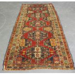 A Shirvan carpet fragment, South-east Caucasus, late 19th/early 20th century, the red field with a