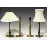A group of three similar mid-20th century turned and reeded wooden table lamps, height 30cm,