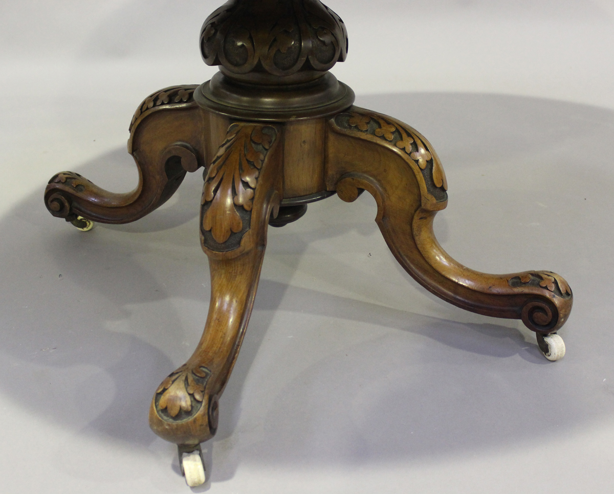 A late Victorian burr walnut oval tip-top breakfast table, raised on carved cabriole legs, height - Image 3 of 4