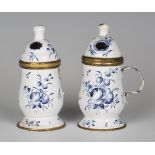 A pair of scarce mid-18th century South Staffordshire enamel mustard pots, finely painted with