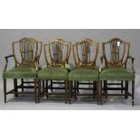 A set of eight Edwardian Neoclassical Revival mahogany and inlaid shield back dining chairs,