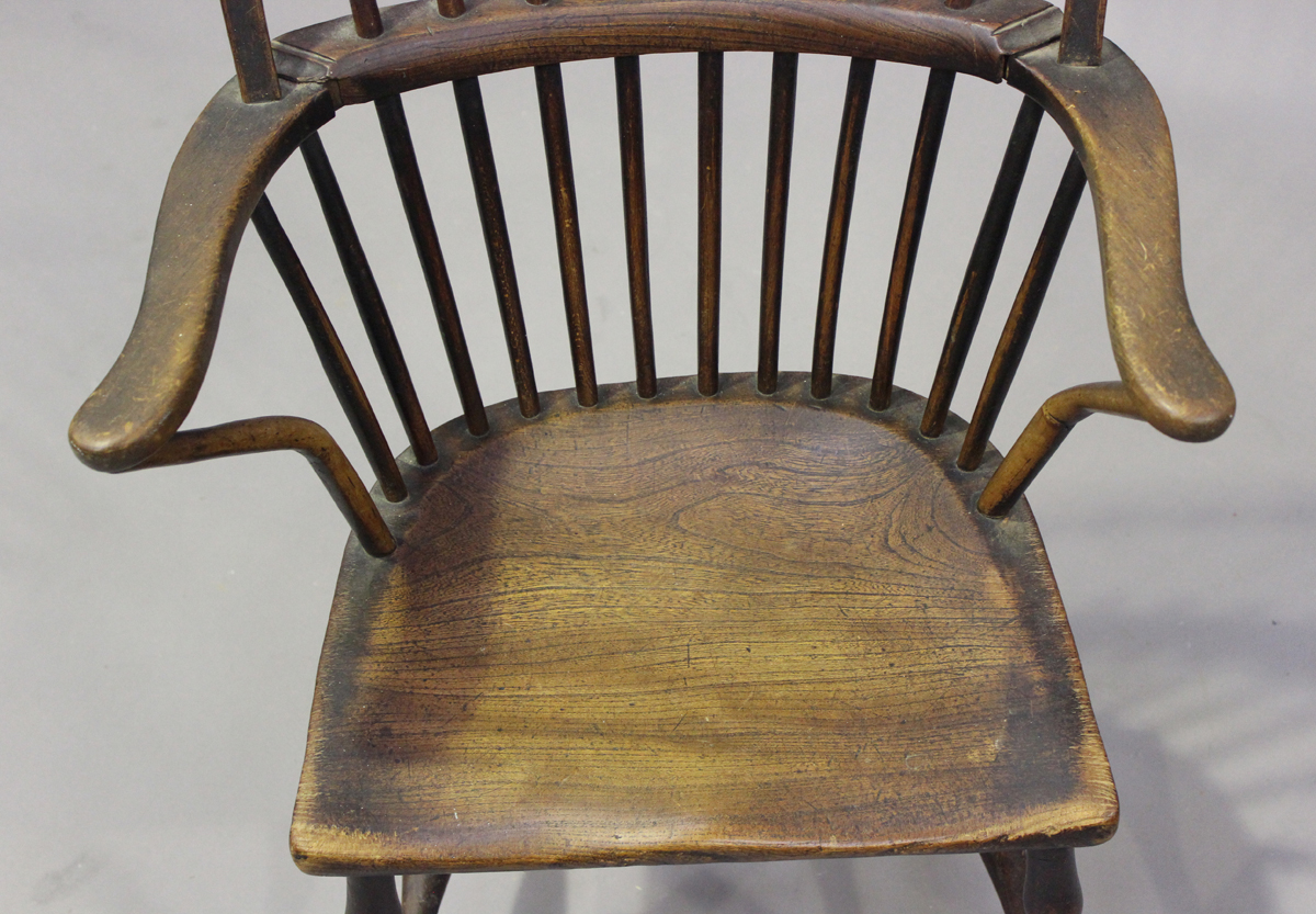 A mid-19th century primitive ash, beech and elm Windsor armchair, the armrests on shaped supports, - Image 4 of 5