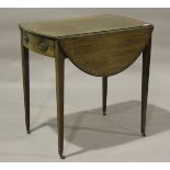 A George III mahogany oval Pembroke table with crossbanded borders, height 73cm, width 77cm.Buyer’