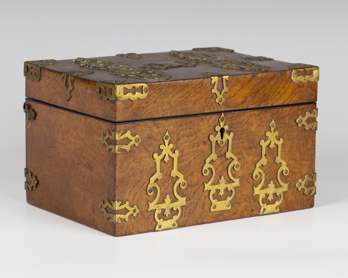 A Victorian Gothic Revival pollard oak and brass mounted jewellery casket, the hinged lid