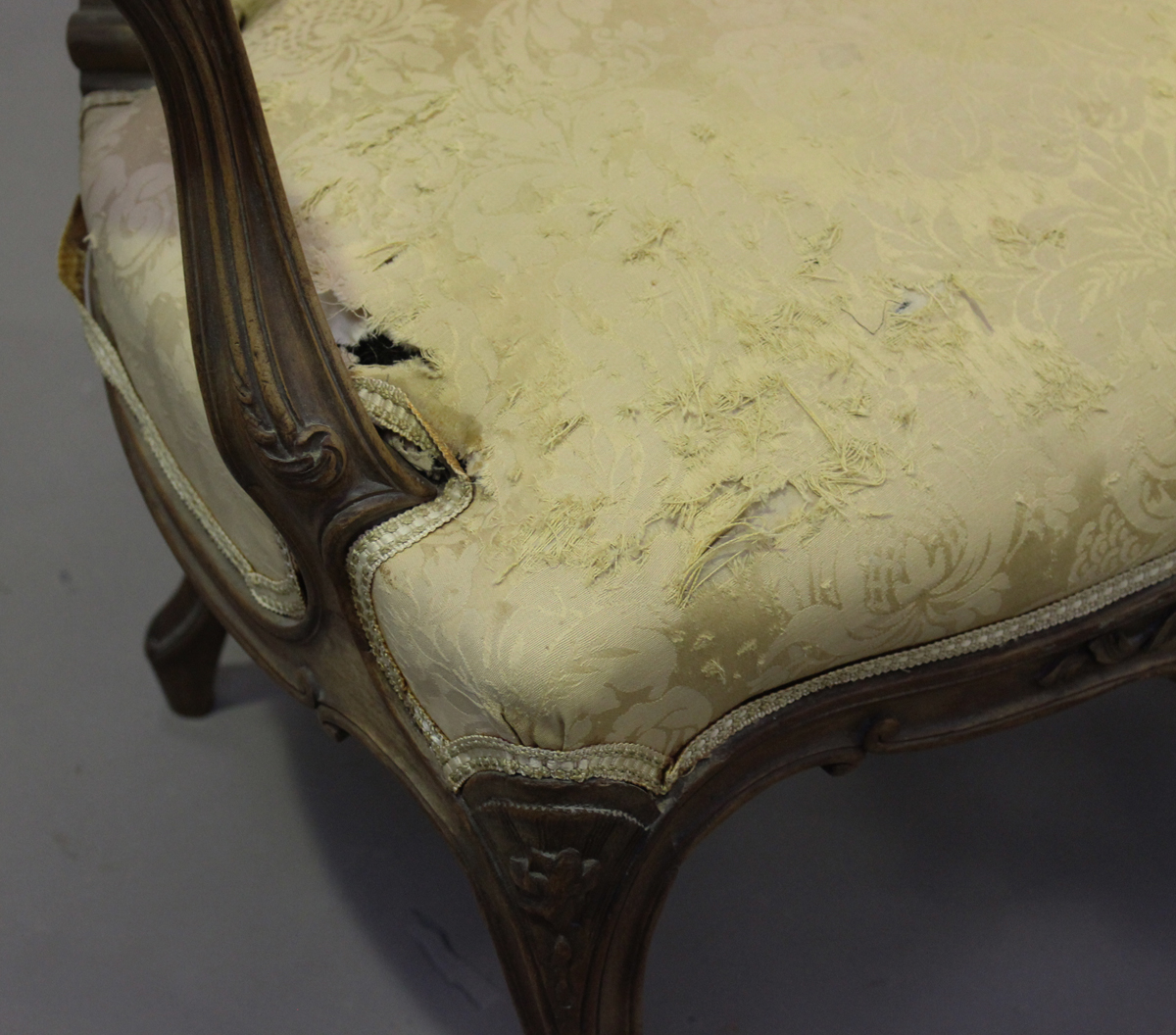 A late 19th century French Louis XV style walnut showframe salon suite, comprising a settee, - Image 6 of 12