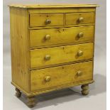 A late Victorian pine chest of drawers, on turned feet, height 110cm, width 91.5cm, depth 49cm.