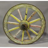 A 19th century Indian polychrome painted wagon wheel, diameter 120cm.Buyer’s Premium 29.4% (