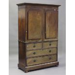 A Victorian mahogany linen press, the two doors above dummy drawers and a single long drawer, height