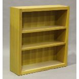 A modern oak open bookcase by Heals, fitted with two adjustable shelves, height 107cm, width