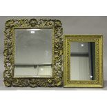 A 20th century gilt painted rectangular wall mirror, the bevelled glass within a frame of shells and