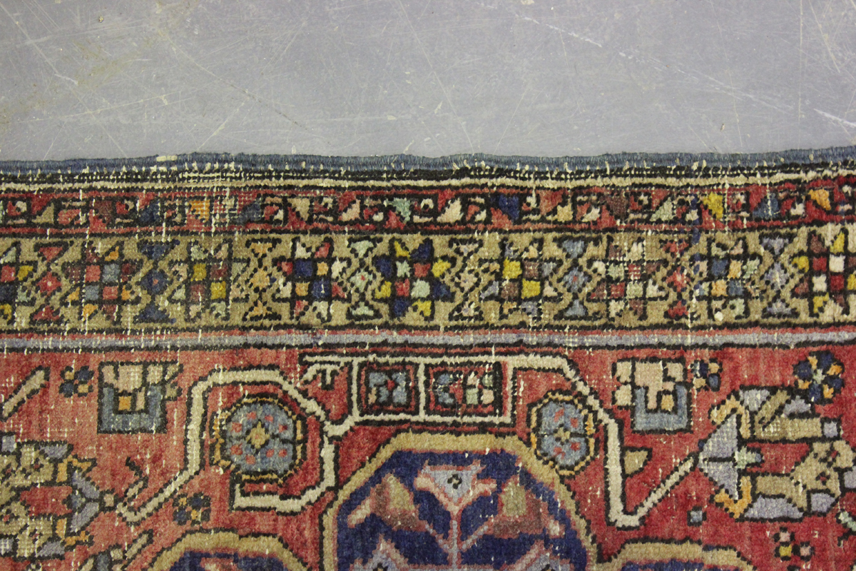 A Hamadan rug, North-west Persia, mid-20th century, the red field with a flowerhead medallion, 175cm - Image 5 of 7