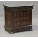 A French Louis Philippe figured mahogany four-drawer commode, the grey marble top above oak-lined