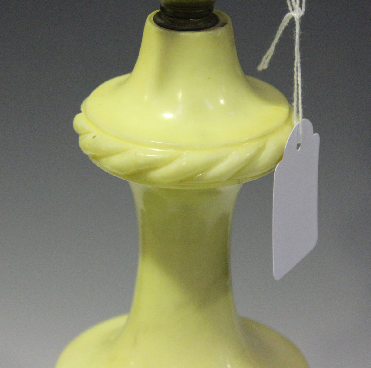 A 20th century alabaster table lamp of slender urn form, height 60cm, together with shade.Buyer’s - Image 2 of 4