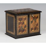 A Victorian Tunbridge ware table-top needlework cabinet, the top and two doors with specimen wood