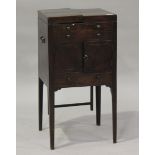 A George III mahogany gentleman's wash cabinet with overall boxwood stringing, the double-hinged top