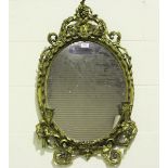 A mid-Victorian gilt composition oval girandole wall mirror, the ribbon effect frame with foliate