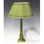 An early 19th century cast brass table lamp, converted to electricity, fitted with a later tole