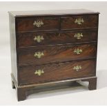 A George III mahogany chest, fitted with two short and three long drawers, raised on bracket feet,