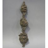 An 18th century carved softwood wall applique, finely modelled in the form of a hanging pendant of