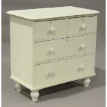 A late Victorian painted pine chest, on turned feet, height 81cm, width 83cm, depth 46cm.Buyer’s