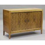 A mid-20th century teak 'Double Helix' side cabinet by Gordon Russell Limited, designed by David