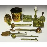 A group of 19th century and later copper and brassware, including a jelly mould, numbered '249',