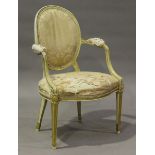 A George III white painted and gilt elbow chair, the moulded frame with stiff leaf and rosette