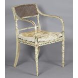 A Regency painted elbow chair, decorated with overall floral swags on a pale green ground, height