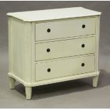 A modern French style cream painted chest of three drawers, height 81cm, width 90cm, depth 45cm.