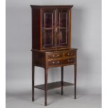 An Edwardian rosewood display cabinet-on-stand by Collinson & Lock, London, the dentil pediment