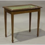 A 20th century Edwardian style mahogany bijouterie table with fruitwood inlay and boxwood stringing,