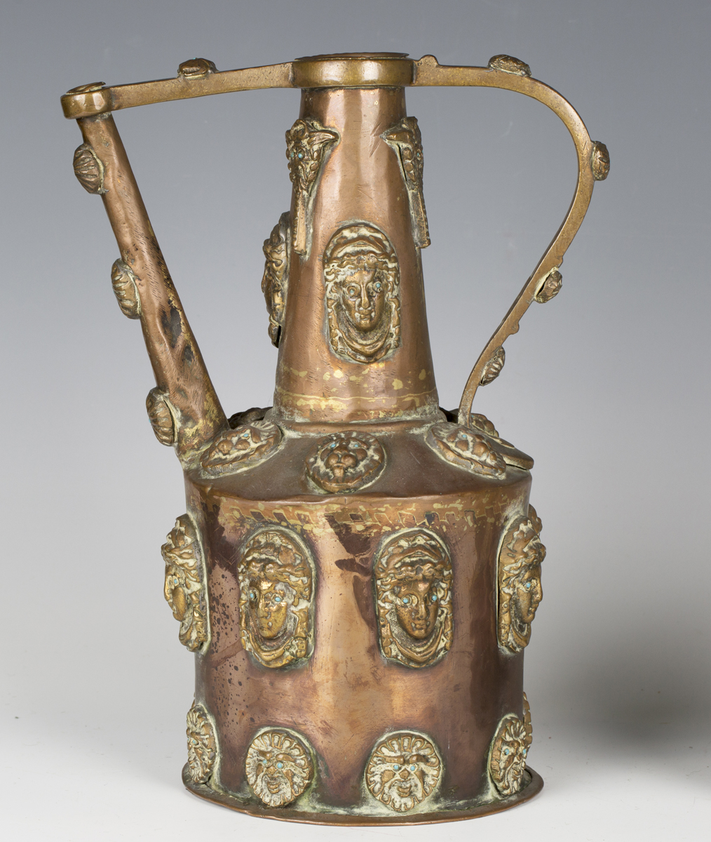 A 19th century copper and brass mounted ewer, applied with overall masks inset with turquoise - Image 2 of 5