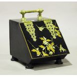 A late Victorian Aesthetic Movement tole painted and brass mounted coal purdonium, the hinged lid