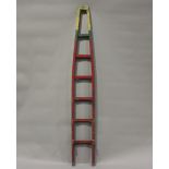 An early 20th century painted ladder, inscribed to both sides 'The International Ltd Court Holborn