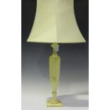 A 20th century alabaster table lamp of slender urn form, height 60cm, together with shade.Buyer’s