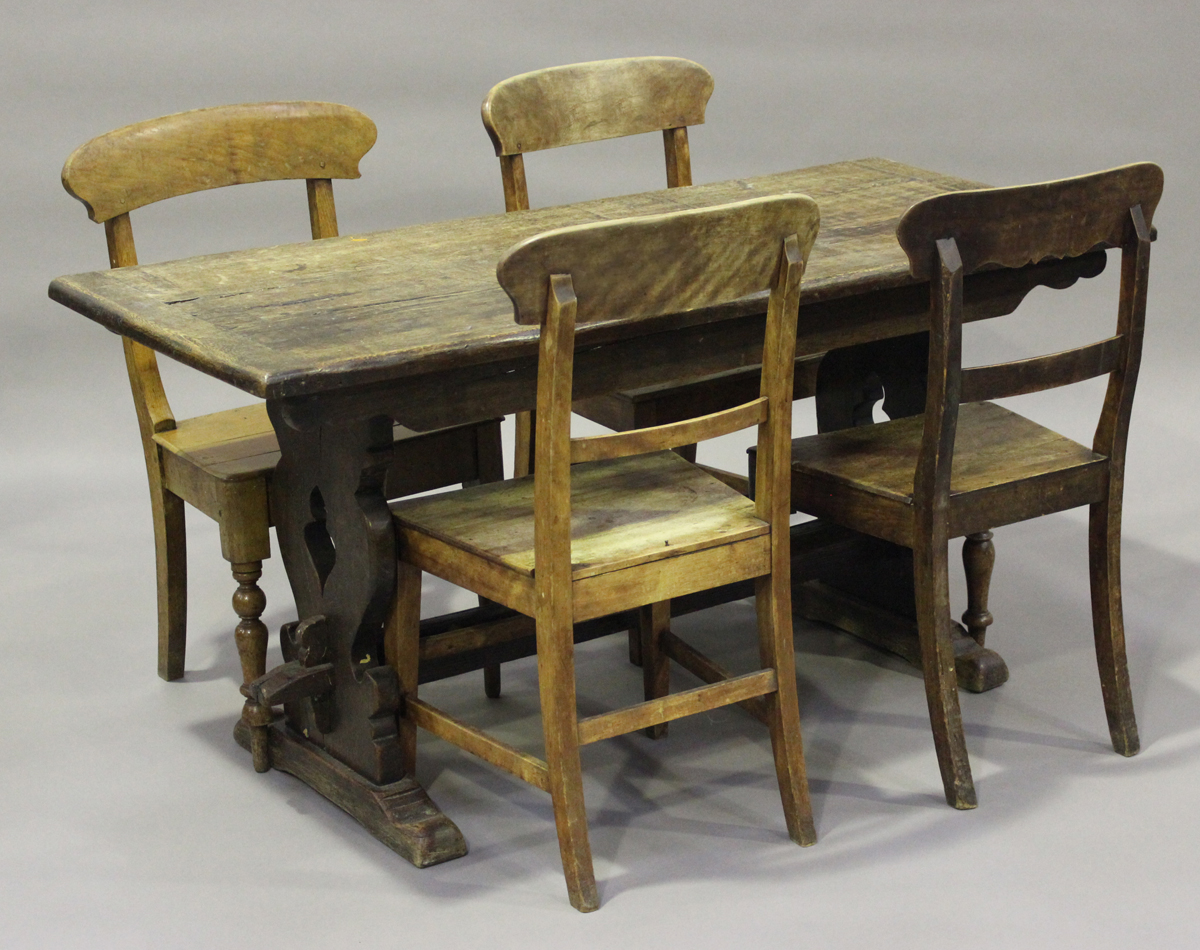 A mid-20th century oak refectory table, on pierced supports, height 73cm, length 150cm, depth