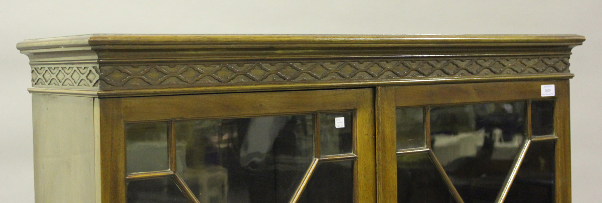 An Edwardian mahogany display cabinet-on-stand, enclosed by two astragal glazed doors, on cabriole - Image 4 of 4