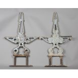 A pair of French cast iron garden double-sided bench ends, detailed 'JAF 1965' and bearing