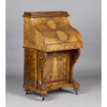 A late 19th/early 20th century burr walnut pop-up piano Davenport of unusual proportions, the