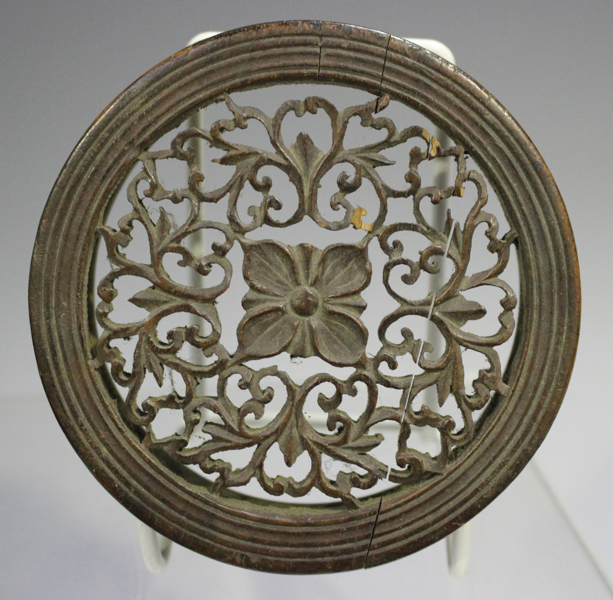A Chinese hardwood circular stand, late 19th/early 20th century, carved with a keyfret and foliate - Image 19 of 19