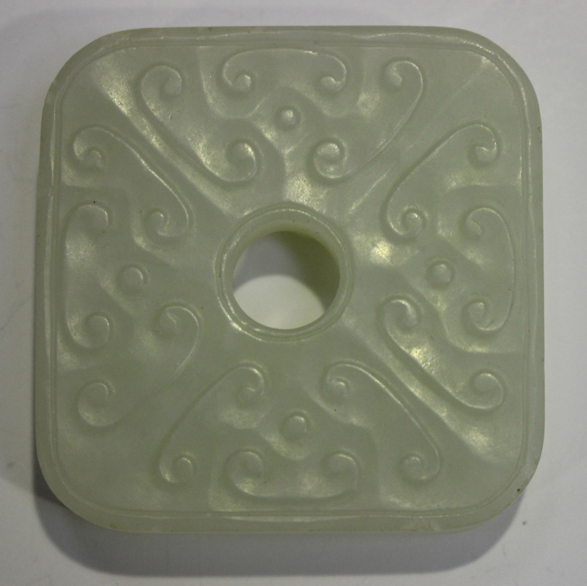 Two Chinese pale celadon jade pendants, late 19th/20th century, the first carved in the form of a - Image 7 of 8