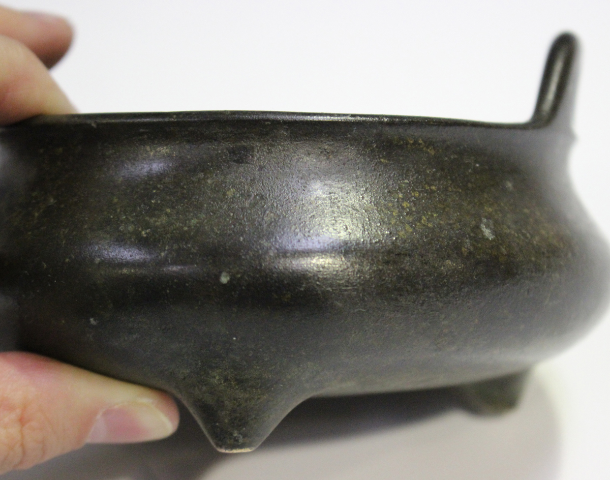 A Chinese brown patinated bronze tripod censer, mark of Xuande but probably Qing dynasty, of - Image 2 of 8