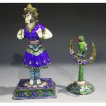 An Indian enamelled white metal articulated four-section figure of a female dancer, early 20th