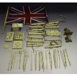 A collection of Chinese Canton export ivory items, mid-19th century, including two tangram puzzle