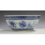 A Chinese blue and white porcelain punch bowl, mark of Kangxi but late 19th century, the exterior